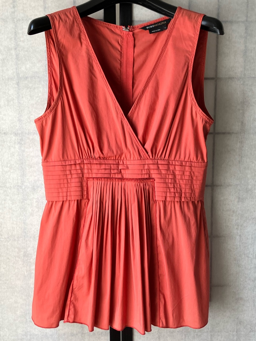 BCBGMAXAZRIA Coral Red V-Neck Sleeveless Top Pleated Waist Front Design Size S